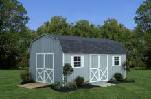 Dutch Barn 12′ x 20′ • Light grey siding, white trim and shutters, black shingles.