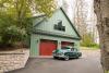 Custom Elite Garage with Hardi Siding and Carriage House Garage Doors